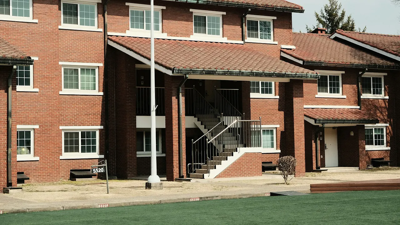 Residential strata complex with common-property grounds and shared areas